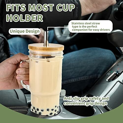 Reusable boba cup with straw in car cup holder.