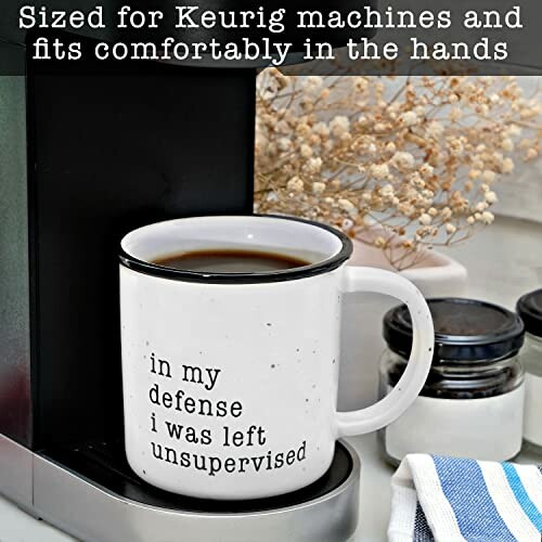 White mug with text on a Keurig machine.