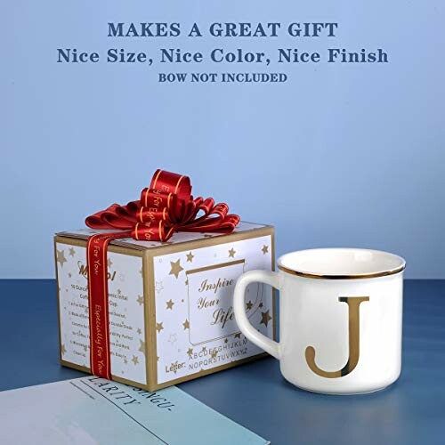 Gift box with a letter J mug and ribbon.