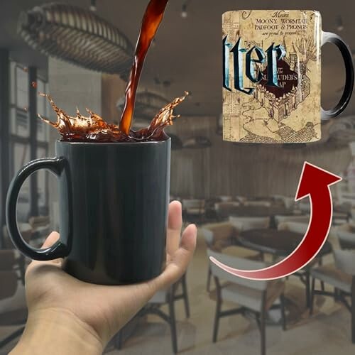 Hand holding a black mug with coffee being poured, featuring a magical design change.