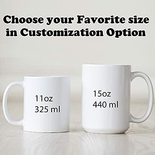 Comparison of two white mugs with sizes 11oz 325ml and 15oz 440ml displayed.