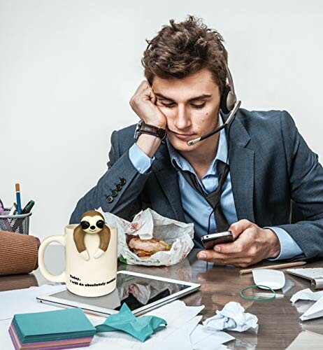 Tired office worker with headset, coffee mug, and scattered papers.