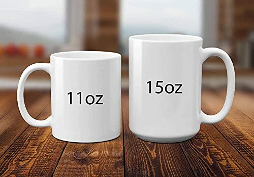 Two white mugs, 11oz and 15oz, on a wooden table